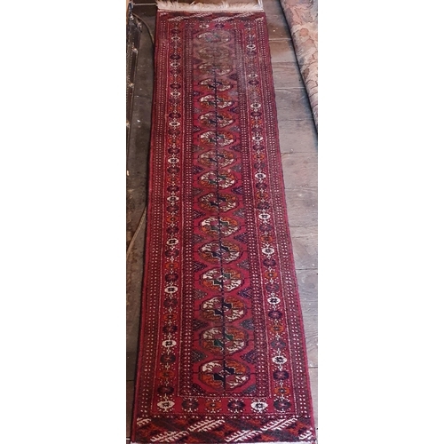 853 - A small Persian Rug. 200 x 53 cm approx.