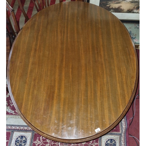 339 - A large 19th Century Mahogany oval supper Table with molded edge on quatrefoil base.
H 72 x D 107 W ... 