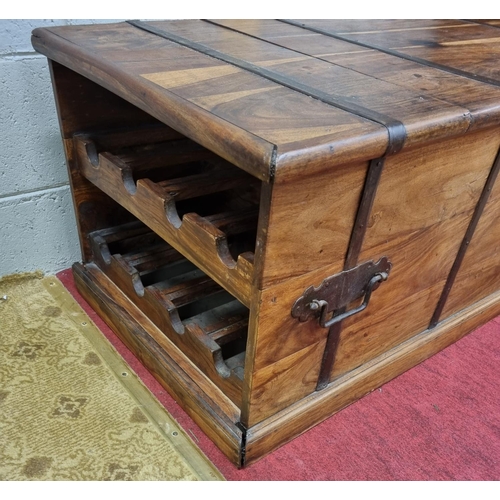 71 - A hardwood Metal bound Trunk/ Coffee Table.