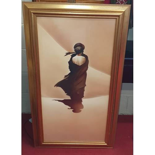 109 - A coloured Print of an Arab holding a boy. In a gilt frame. 116 x 65 cm approx.