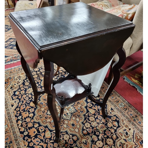 245 - An early 20th Century drop leaf games Table. 44 x 46 cm approx. dropped. 76 x 76cm approx. up.