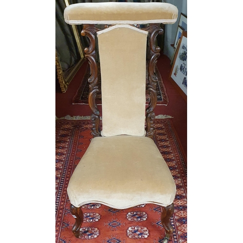 246 - A 19th Century Walnut Showframe Prie Dieu on carved cabriole front supports and brass castors. W44 x... 