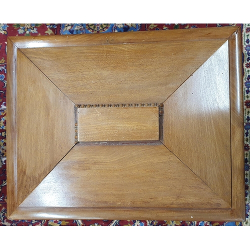 293 - A Mahogany Cellarette of sarcophagus form on bun feet, the interior with lead lined compartment for ... 