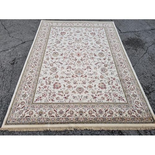 346 - A lovely and large Ivory ground Carpet with an unique floral pattern design. 400 x 273 cm approx.