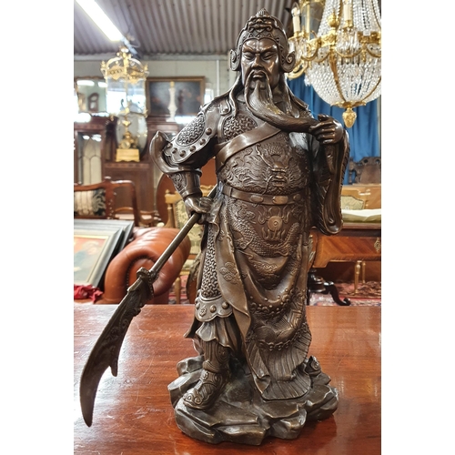 28 - A Bronze Figure Legendary Chinese General Guan Yu. Dimensions (H x W x D) approx. 37 x 22 x 22 cm