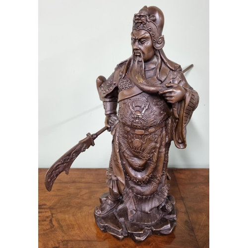 28 - A Bronze Figure Legendary Chinese General Guan Yu. Dimensions (H x W x D) approx. 37 x 22 x 22 cm