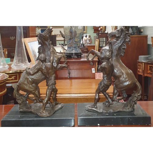 66 - A pair of Bronze figure horses with riders 'Marly Horses' after G.Cousteau. Dimensions (H x W x D) 3... 