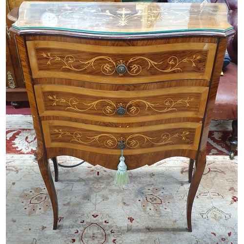 68 - Of really good quality. A Rosewood and Satinwood Inlaid triple drawer Side Cabinet with serpentine o... 