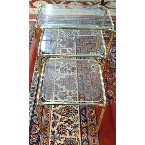 77 - A modern glass top Coffee Table 10 x 65cm approx. along with a modern glass top Side Table W134 x D4... 