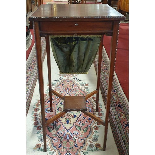 80 - A late 19th Century Mahogany Work Table of square form with square tapered supports and fitted inter... 