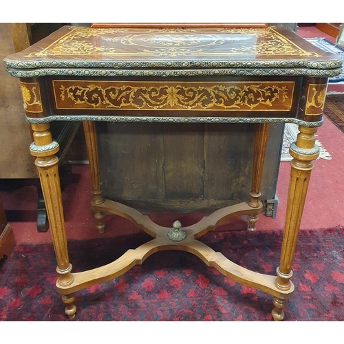 89 - A Rosewood and Inlaid fold over Card Table with turned supports and ormolu mounts and highly inlaid ... 