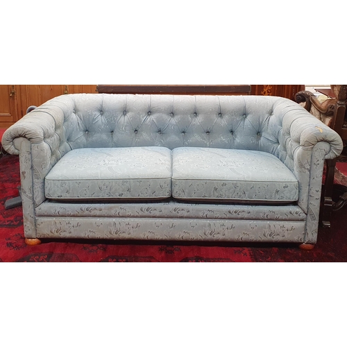 93 - A pair of Chesterfield Sofas with deep button outline. W175 x D89 x H72cm approx.