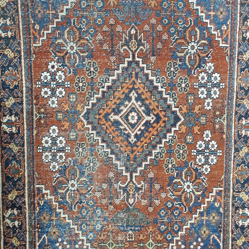 241 - A Persian Rug with unique medallion design and multi borders.
L 170 x W 126 cm approx.
