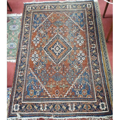 241 - A Persian Rug with unique medallion design and multi borders.
L 170 x W 126 cm approx.
