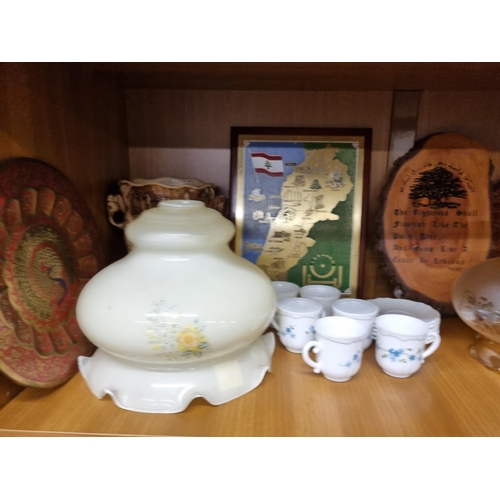 283 - A large quantity of decretive Items on two shelves.