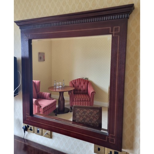 82 - A Mahogany Veneered Wall Mount Bevelled Mirror.
Height 103 X w 106 cm approx. 
(Please note this is ... 