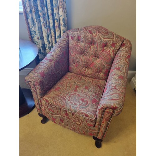 112 - A Floral Rust Coloured Armchair.
Height 93 x W 70 x D 70 cm approx. 
(Please note this is a Generic ... 