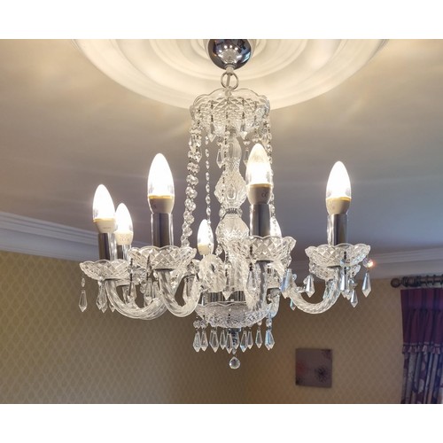 875 - A 8 Branch Cut Glass and Crystal Chandelier .
Height 60 Diameter 45 cm approx.
(Please note this is ... 