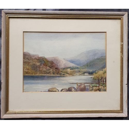 62 - A 19th Century Watercolour of a lake scene. Description verso. No apparent signature. 16 x 22 cm app... 