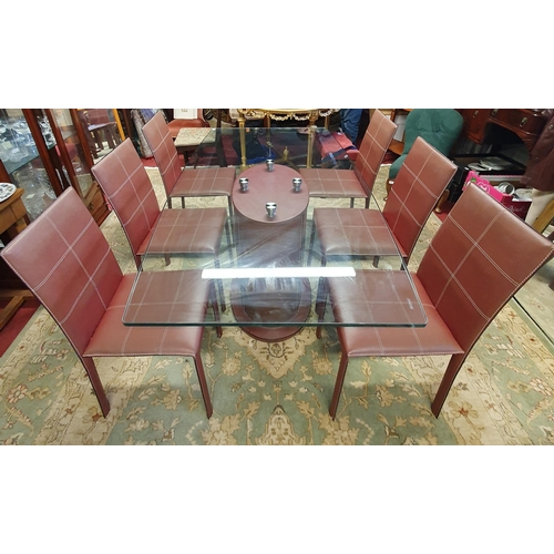 68 - A really good modern Dining Table  with glass top and centre base, faux leather chairs. In very good... 