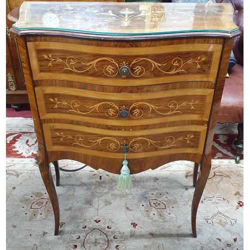 51 - Of really good quality. A Rosewood and Satinwood Inlaid triple drawer Side Cabinet with serpentine o... 