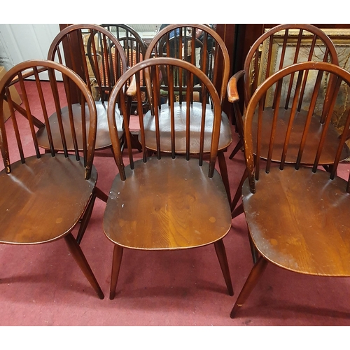 870 - A Set of 6 Ercol chairs to include to Armchairs