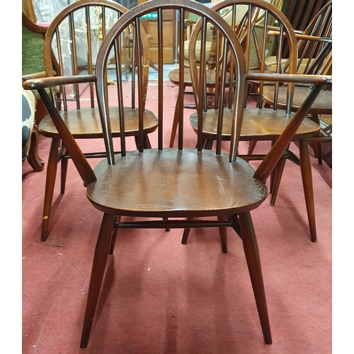 870 - A Set of 6 Ercol chairs to include to Armchairs