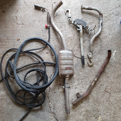 872 - Garage Lot , to include an  Exhaust Pipe ,Pulley , Pipes, Blow Torch and rubber hose .