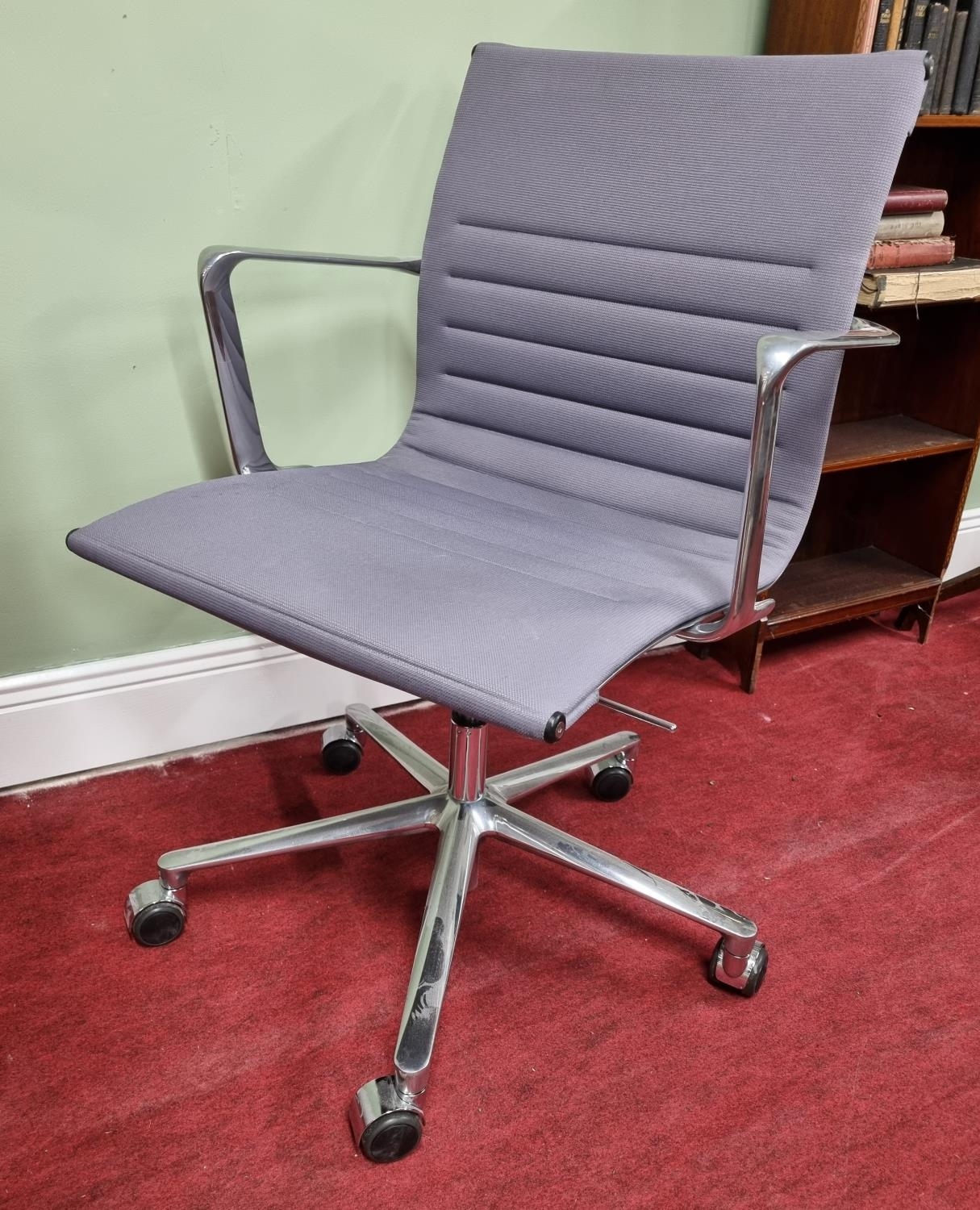 A good Retro style Chrome upholstered Desk Chair in the style of Eames