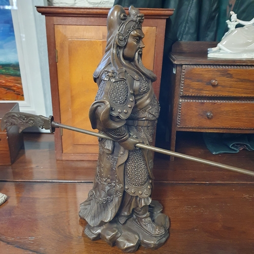 555 - A Bronze Figure Legendary Chinese General Guan Yu. Dimensions (H x W x D) approx. 37 x 22 x 22 cm