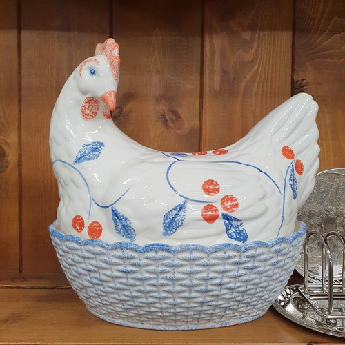 104 - A large Masons Meat Platter along with two egg holders in the form of a duck and a hen, a quantity o... 