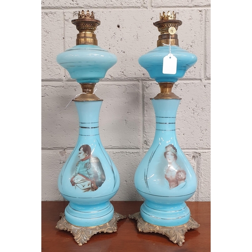 133 - A Pair of 19th Century opaline blue glass Oil Lamps decorated with the portraits of Napoleon and Jos... 