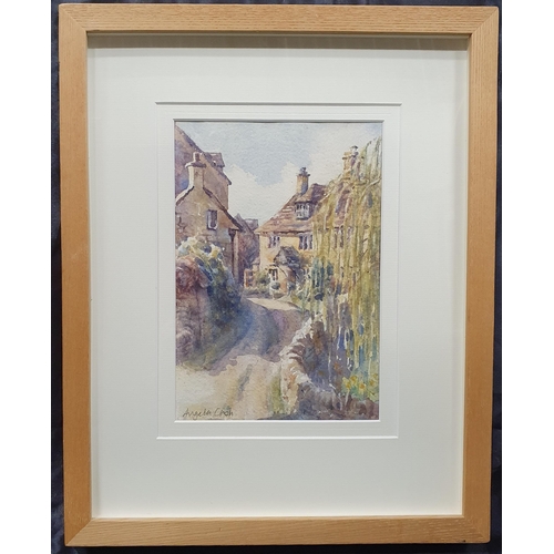 137 - Angela Cash. A 20th Century Watercolour of a street scene with a weeping willow to the fore. Signed ... 