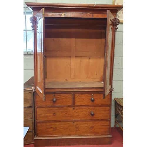 144 - A 19th Century Mahogany Gentleman's Linen Press with twin door top over two short and two long drawe... 