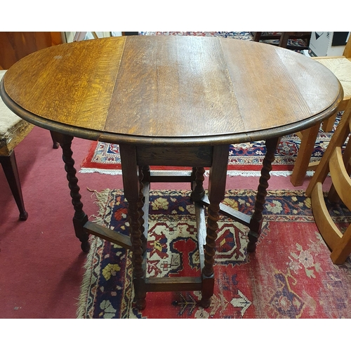 217 - An early 20th Century Oak miniature gateleg Table with barley twist supports. W 62 x 90 x H 73 cm ap... 