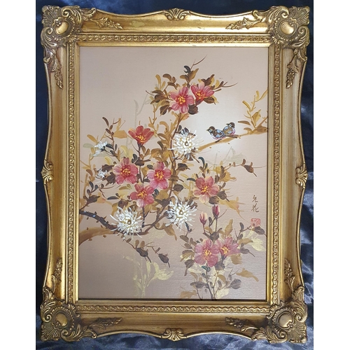 22 - An Oriental Oil on Canvas still life of birds on a branch with blossom. Indistinctly signed middle r... 