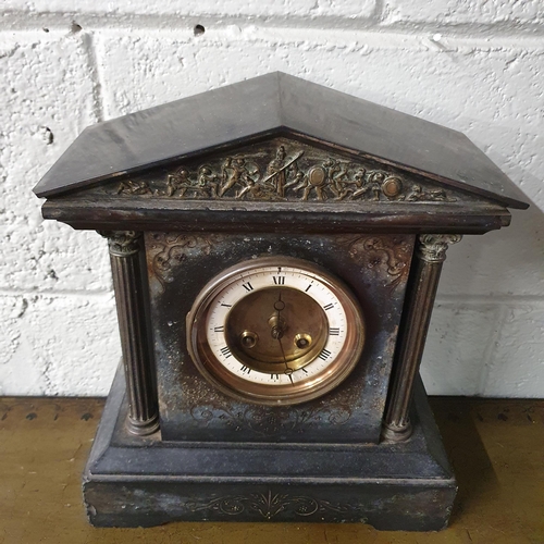 266 - A 19th Century slate 8 day Mantel Clock of architectural form having a white enamelled clock face wi... 