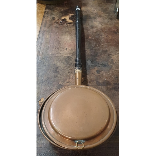 27 - A 19th Century Copper Warming Pan.