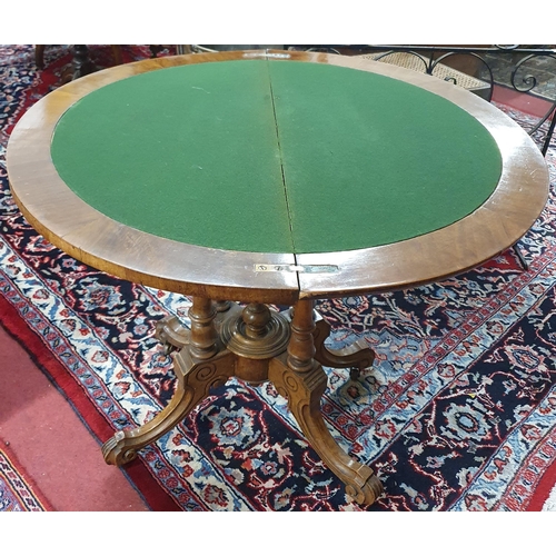 329 - A 19th Century Walnut, Veneered and Inlaid half moon foldover Card Table. The table having floral in... 