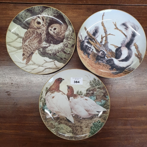 384 - A good group of Collectors Plates of wild animals. D 19 cm approx.