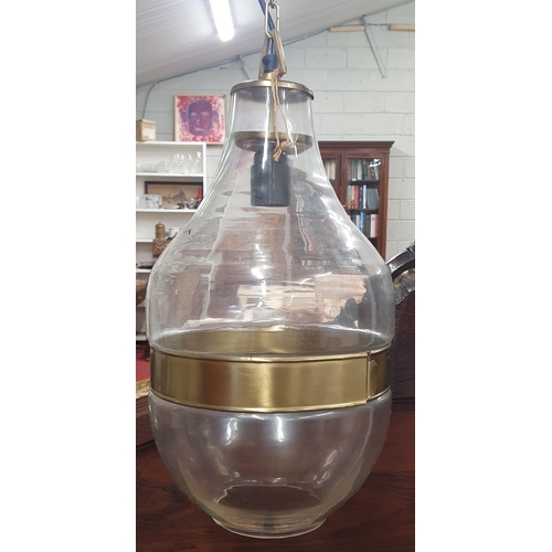 389 - A 20th Century Copper and metal Lantern along with a bulbous hanging light.