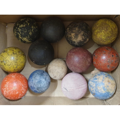 408 - A loose collection of croquet Mallets and Balls. #