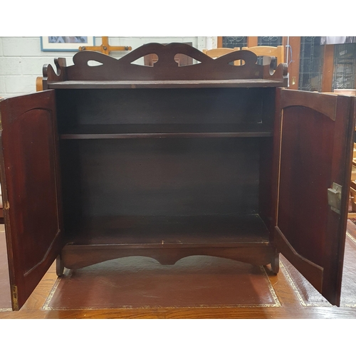 414 - An Edwardian Mahogany two door wall mounted cupboard. W 58 x D 20 x H 60 cm approx.