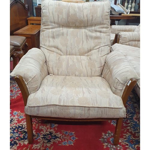 416 - A good Ercol four piece Suite consisting of a three seater couch, two armchairs and a stool. Couch W... 