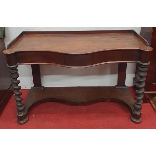 464 - A 19th Century Mahogany Side Table with single drawer frieze on barley twist turned supports. W150 x... 