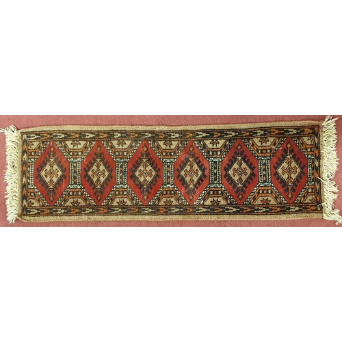 51 - A Persian Prayer Rug with repeating centre design. 100 x 30  cm approx.