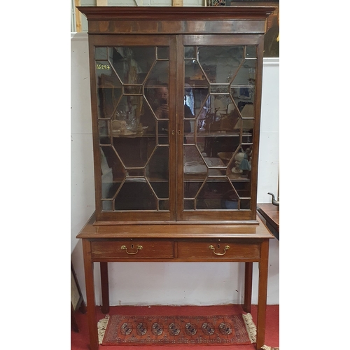 52 - A 19th Century Two door glazed Display Cabinet on stand. W 107 x D 51 x H 189  cm approx.