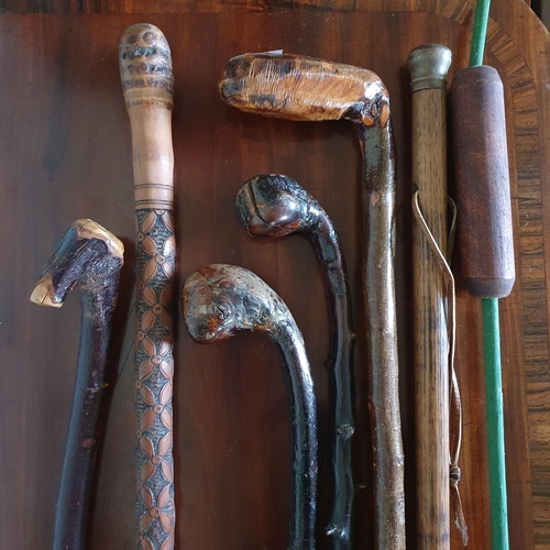 579 - A quantity of vintage Walking Sticks etc.