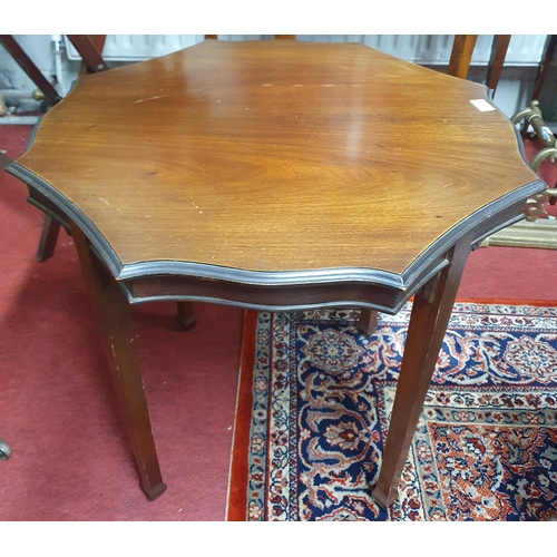 829 - An Edwardian Mahogany Centre Table with scalloped edge on  square tapered supports. D 65 x H 61 cm a... 