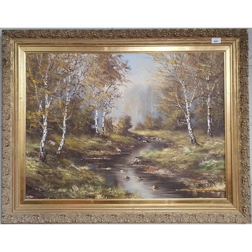 831 - A 20th Century Oil On Canvas of a forest scene with a river in a really good gilt frame, no apparent... 